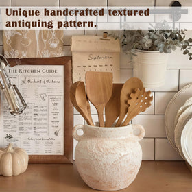 Qinyoung durable ceramic utensil organizer keeps counters stable and reduces spills.