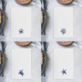 Qpenm coastal towel featuring sea turtle and starfish for beachy vibe and fast drying.