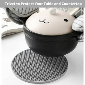 QPIX Digital silicone trivet pot holder in use protects table surface