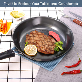 QPIX DIGITAL round hot pad — used as a drying mat for dishes and utensils.