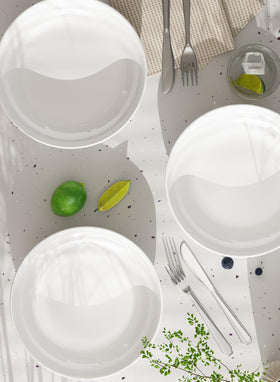 Quatish stackable bowls demonstrating space-saving storage on a shelf.