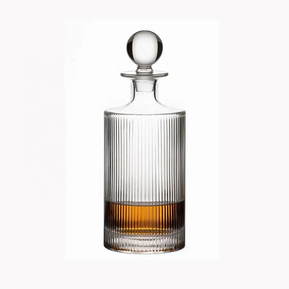 QUEEN&STONE LEAD FREE decanter poured with whiskey beside a glass