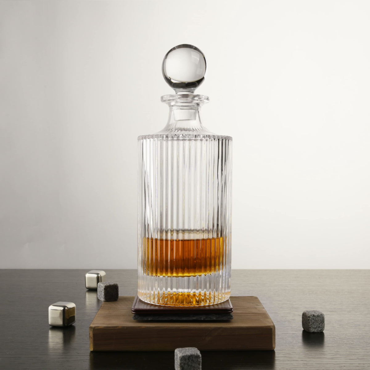 Close-up of QUEEN&STONE LEAD FREE decanter stopper showing a secure glass seal