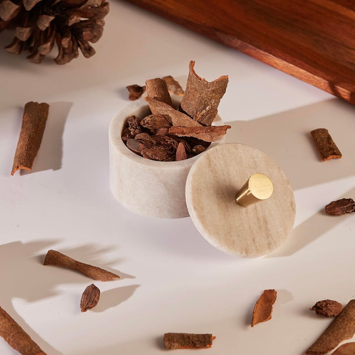 Queenza marble salt cellar closeup highlighting the marble grain for premium kitchen aesthetics.