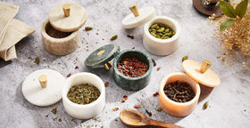 Queenza marble salt cellar storage solution keeps salt tidy and accessible.