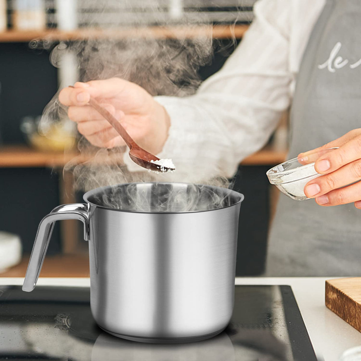 QUIENKITCH versatile pan works on induction, gas, and electric stoves