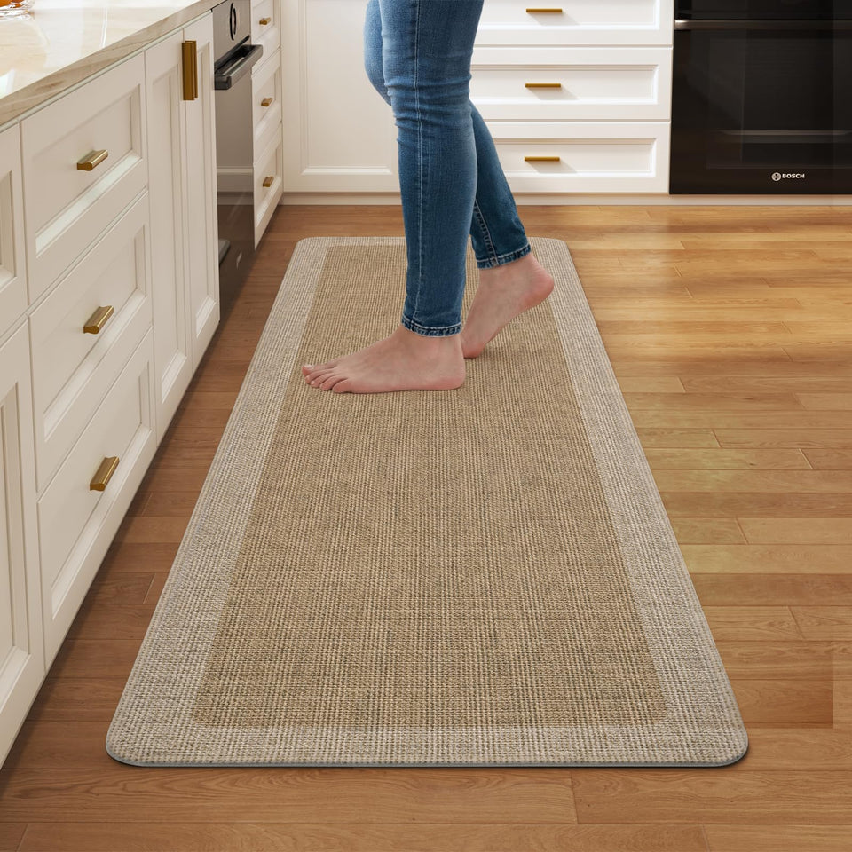 Quqei kitchen mat with non-slip backing keeping the surface stable on tile floors.