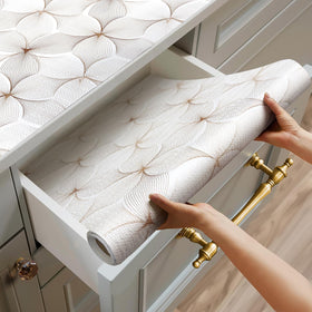 Quttisay flower shelf liner grips securely to prevent sliding on cabinets.