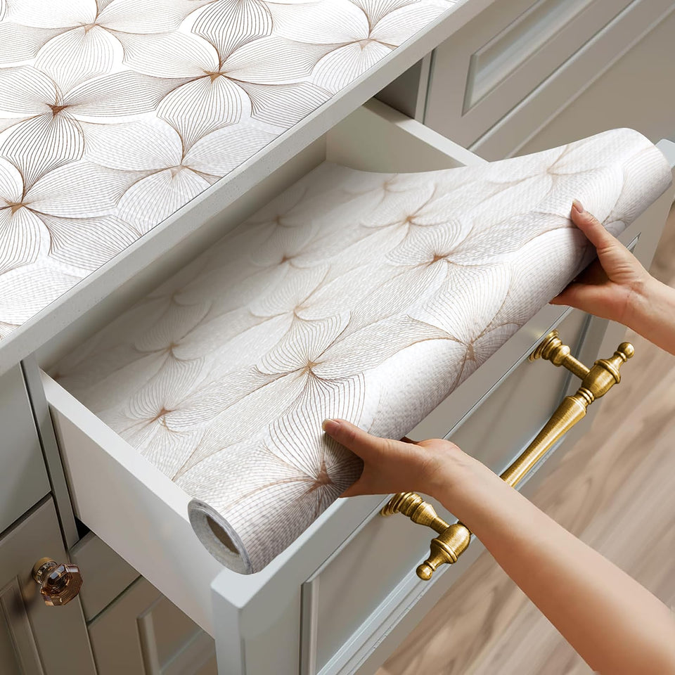 Quttisay flower shelf liner grips securely to prevent sliding on cabinets.