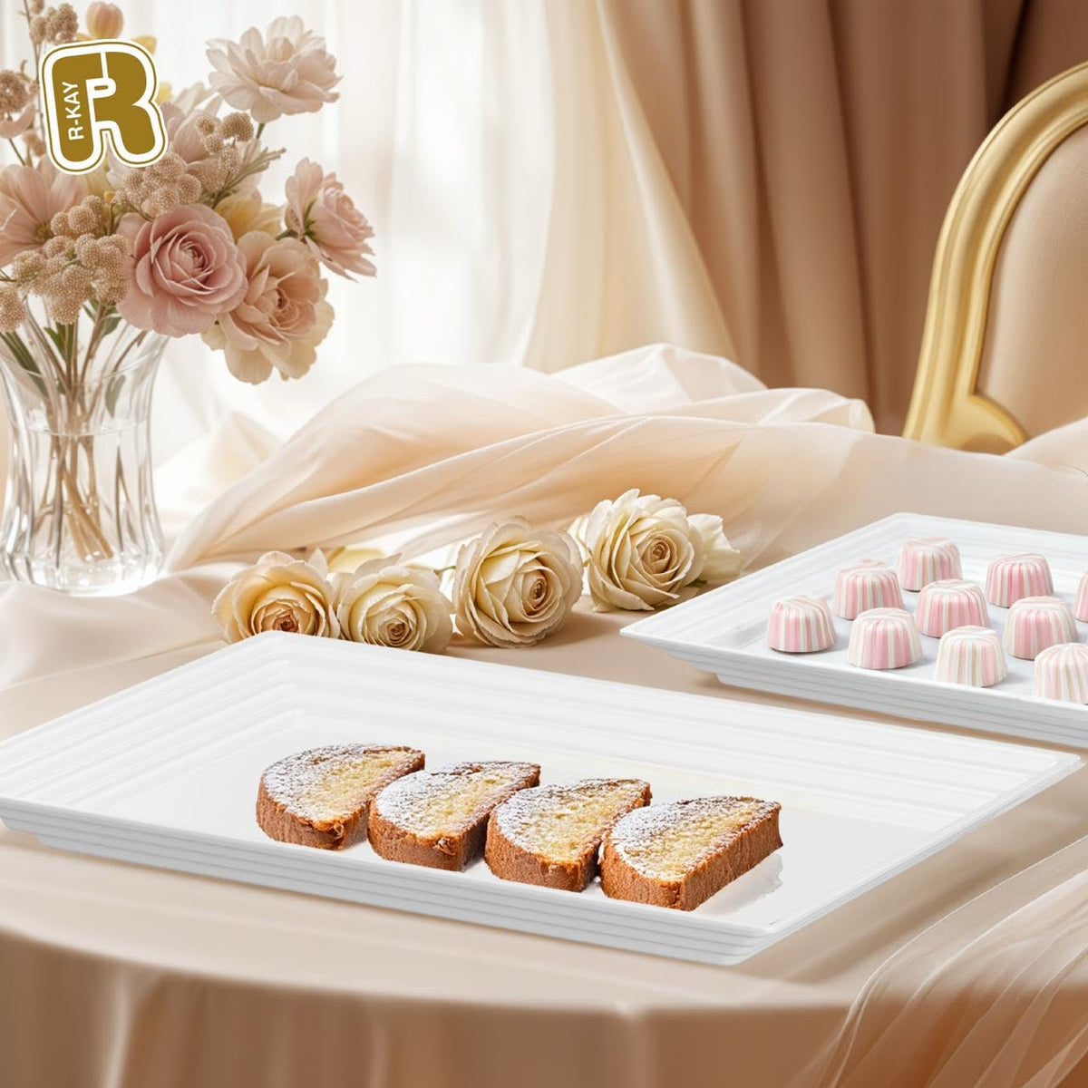 Heavy-duty white plastic trays by R-Kay for sturdy food display.