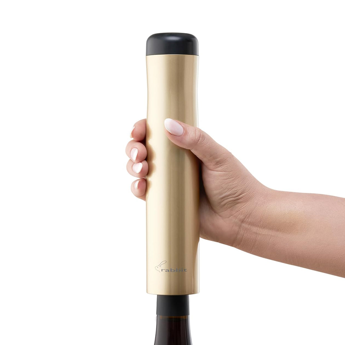 Rabbit electric wine opener in action during bottle opening