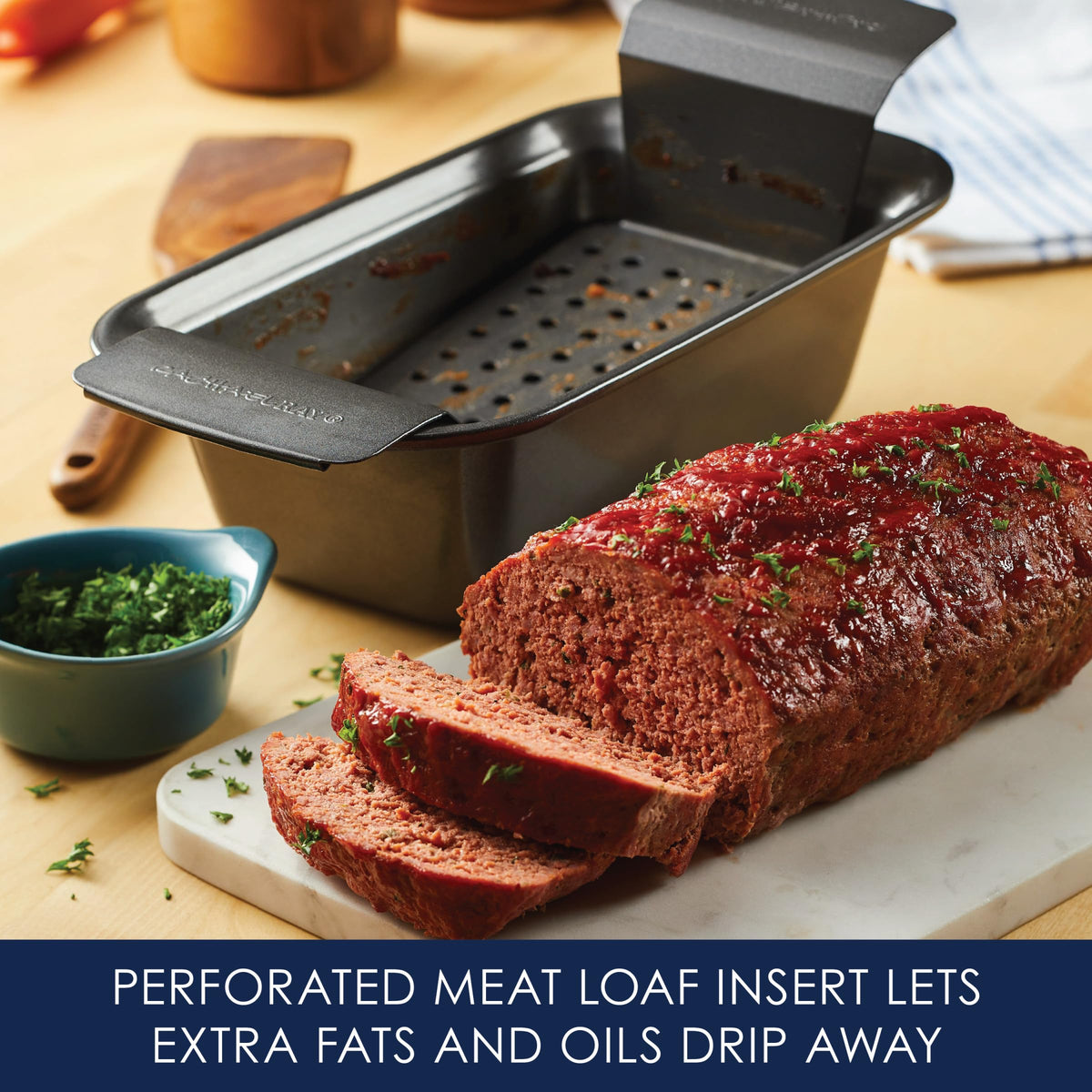 Rachael Ray loaf pan with wide handles for easy lifting.