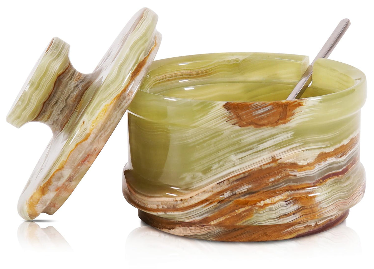 Radicaln marble salt cellar with lid on kitchen counter for fresh storage.