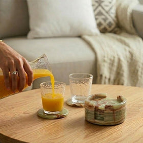 Radicaln coaster bottom with soft felt pad protecting surfaces.