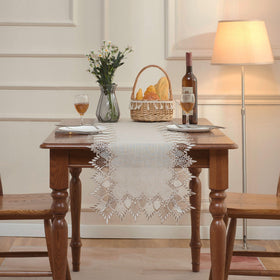 Raedan linen table runner draped over a dresser for elegant everyday decor