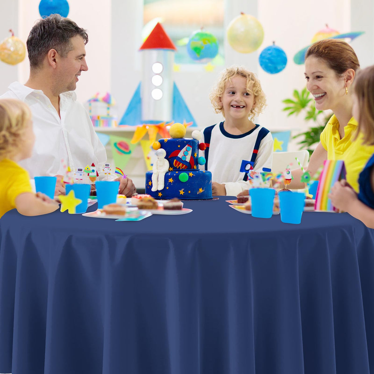 Ragnhild easy-cleanup tablecloth saves time after events.