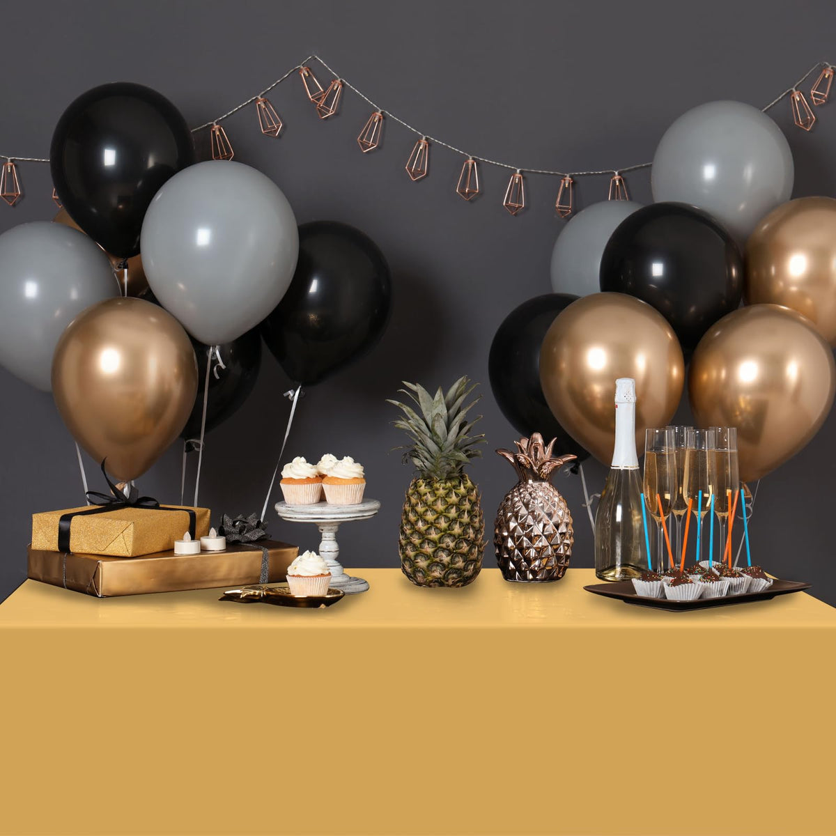 Ragnhild gold tablecloth birthday party setup brings festive glow to celebrations