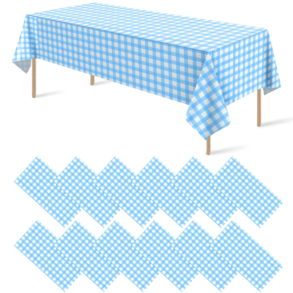 Ragnhild light blue gingham tablecloth, 54x108 inches on a picnic table.