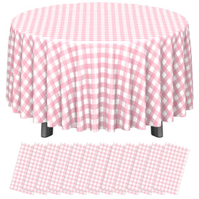 Ragnhild pink-white round gingham tablecloth on a table, ideal for casual picnics.