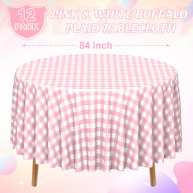 Close-up of Ragnhild pink-white round gingham tablecloth showing pattern and texture.