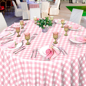Ragnhild pink-white round gingham tablecloth at a wedding reception setup.