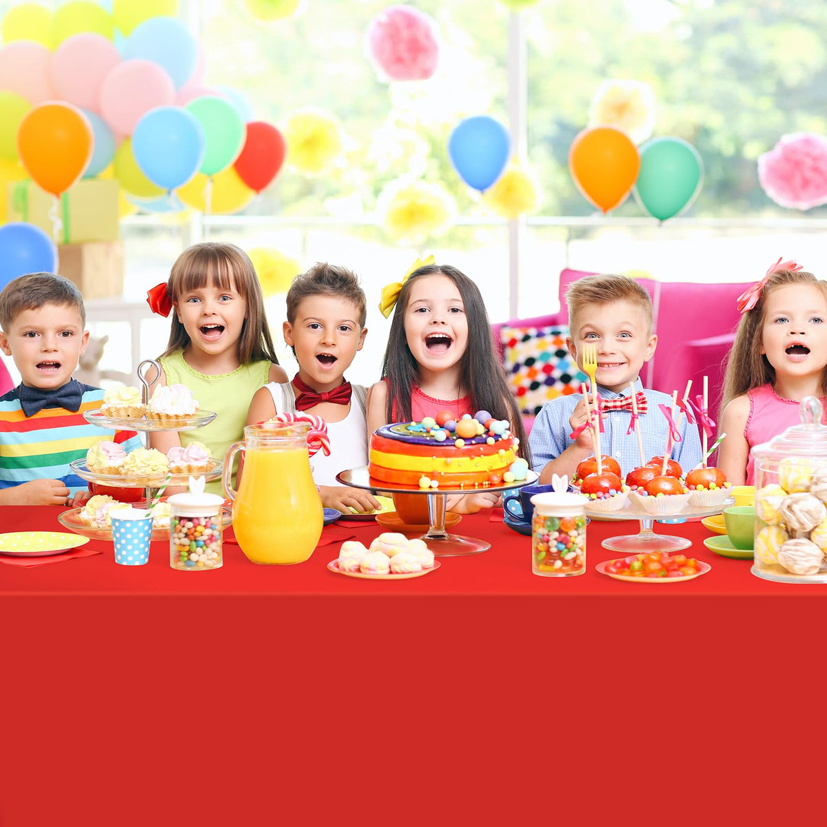 Ragnhild red tablecloth demonstrates waterproof surface protecting the table