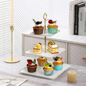RAUVOLFIA holds cupcakes, macarons, desserts, fruit and snacks with style.