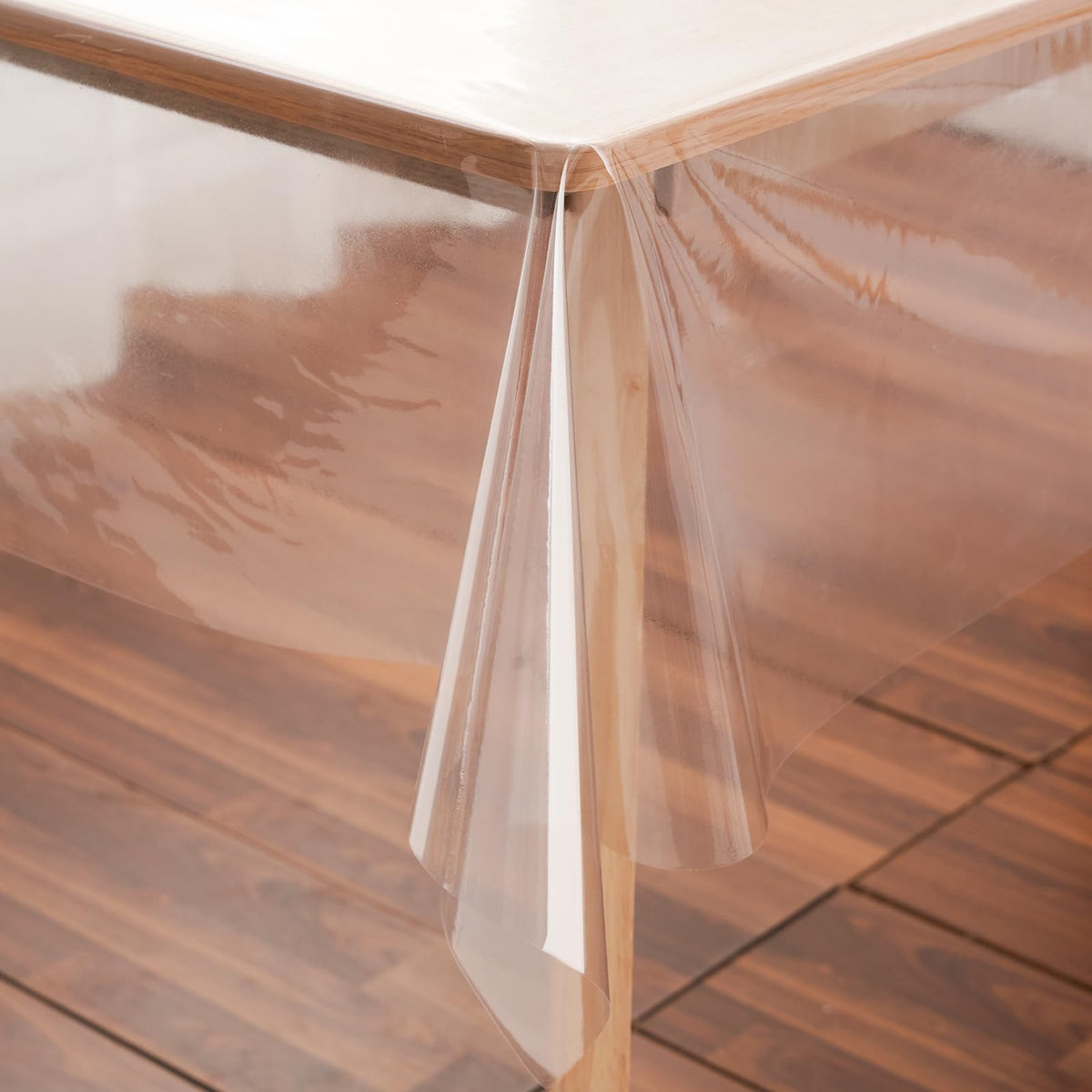 Rawgoodz clear tablecloth on dining table showing wood grain and protecting surface