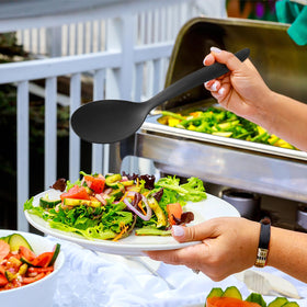 RayPard buffet table setup with black utensils.