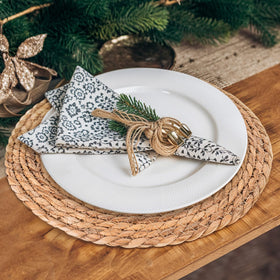 Rcrirth heat-resistant placemats protecting a hot dish on a wooden table