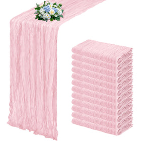 RealBox light pink cheesecloth table runner on a long dining table, elegant and versatile.