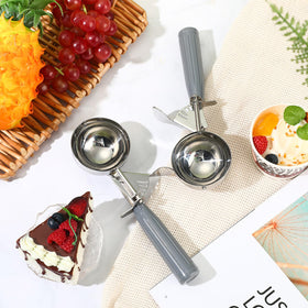 Reallnaive batter scoop helps portion muffin or pancake batter evenly.