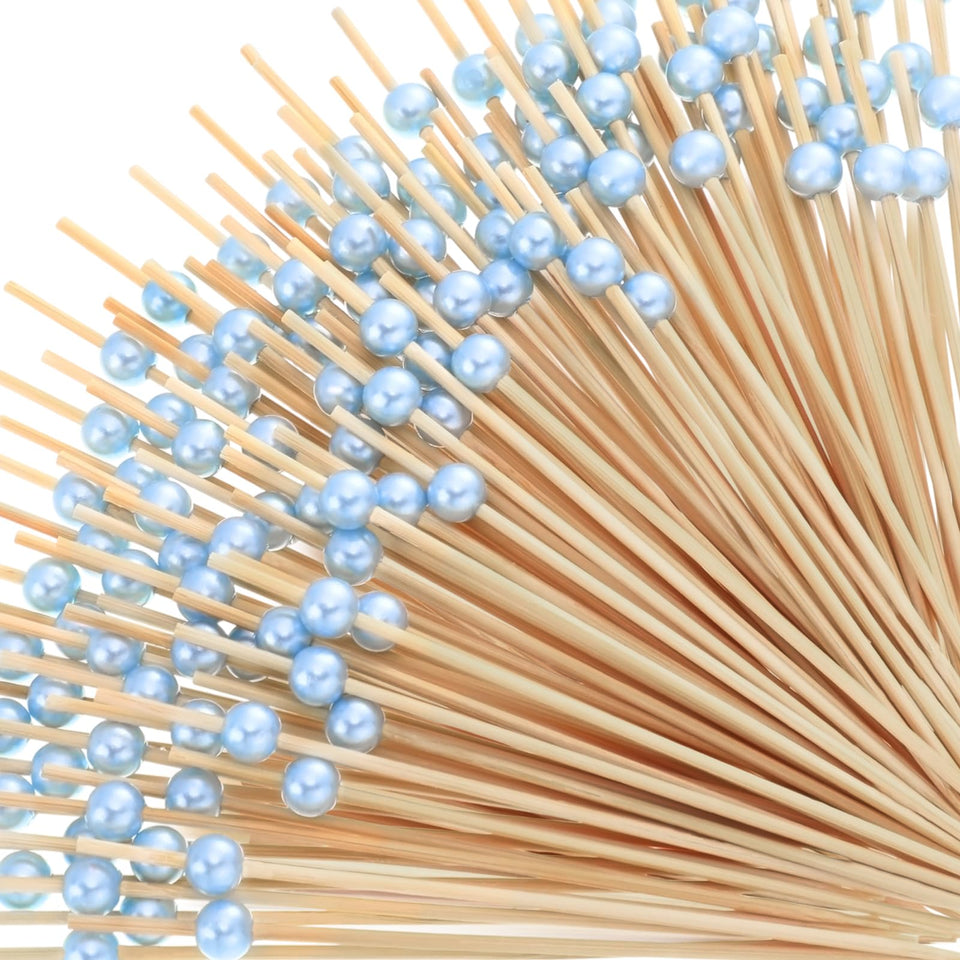 Reallnaive cocktail picks with water blue pearl end for elegant appetizers.