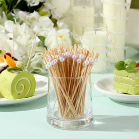 Natural bamboo skewers with pearl ends keep food intact and appealing
