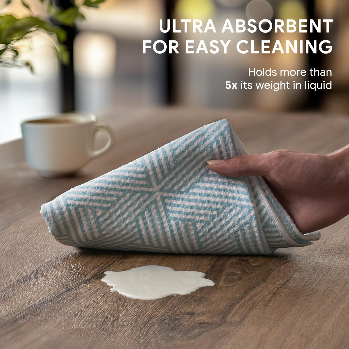 RECYCO microfiber absorbency towel demonstrates holding capacity for damp dishes.