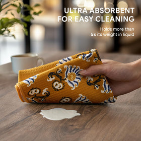 RECYCO Waffle Kitchen Towel Marigold Mosaic used to dry dishes with high absorbency.