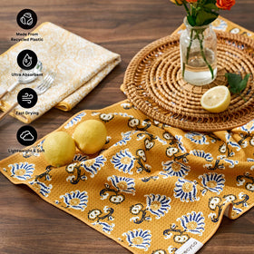 RECYCO Waffle Kitchen Towel Marigold Mosaic drying rack scene demonstrates quick drying capability.