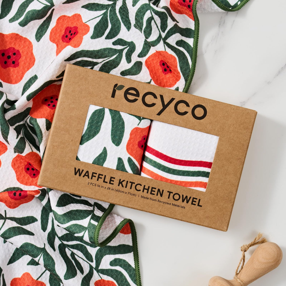 Eco-friendly RECYCO towels highlighting recycled plastic origin and sustainability.