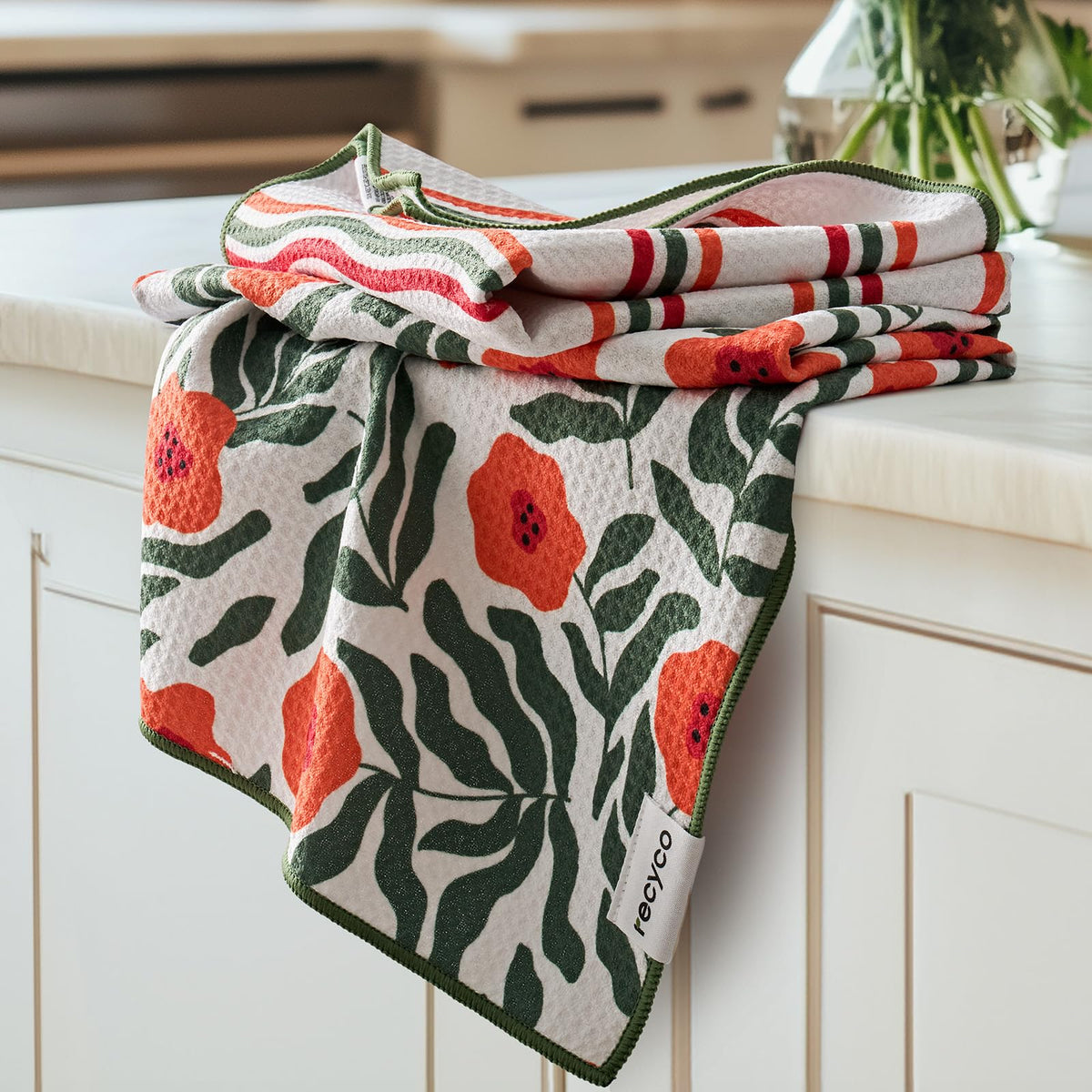 RECYCO waffle kitchen towels set of 2 folded on counter, quick-dry performance.