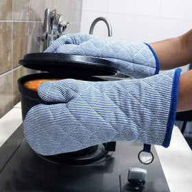 Red LMLDETA blue oven mitt protects hands during microwave use.