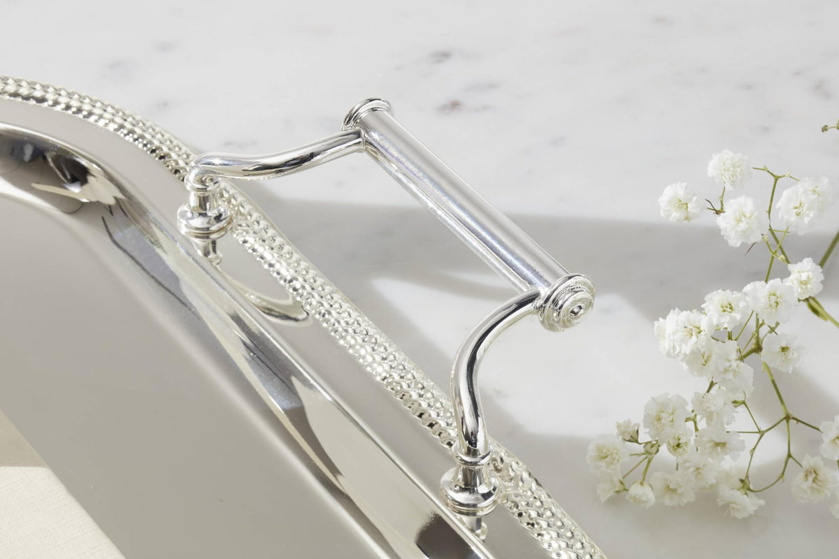 Reed & Barton mirror finish silverplate tray catches light beautifully.
