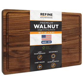 Refine Kitchenware black walnut cutting board in full view for versatile prep and serving.