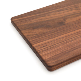 Refine Kitchenware black walnut cutting board non-slip base keeps prep steady.