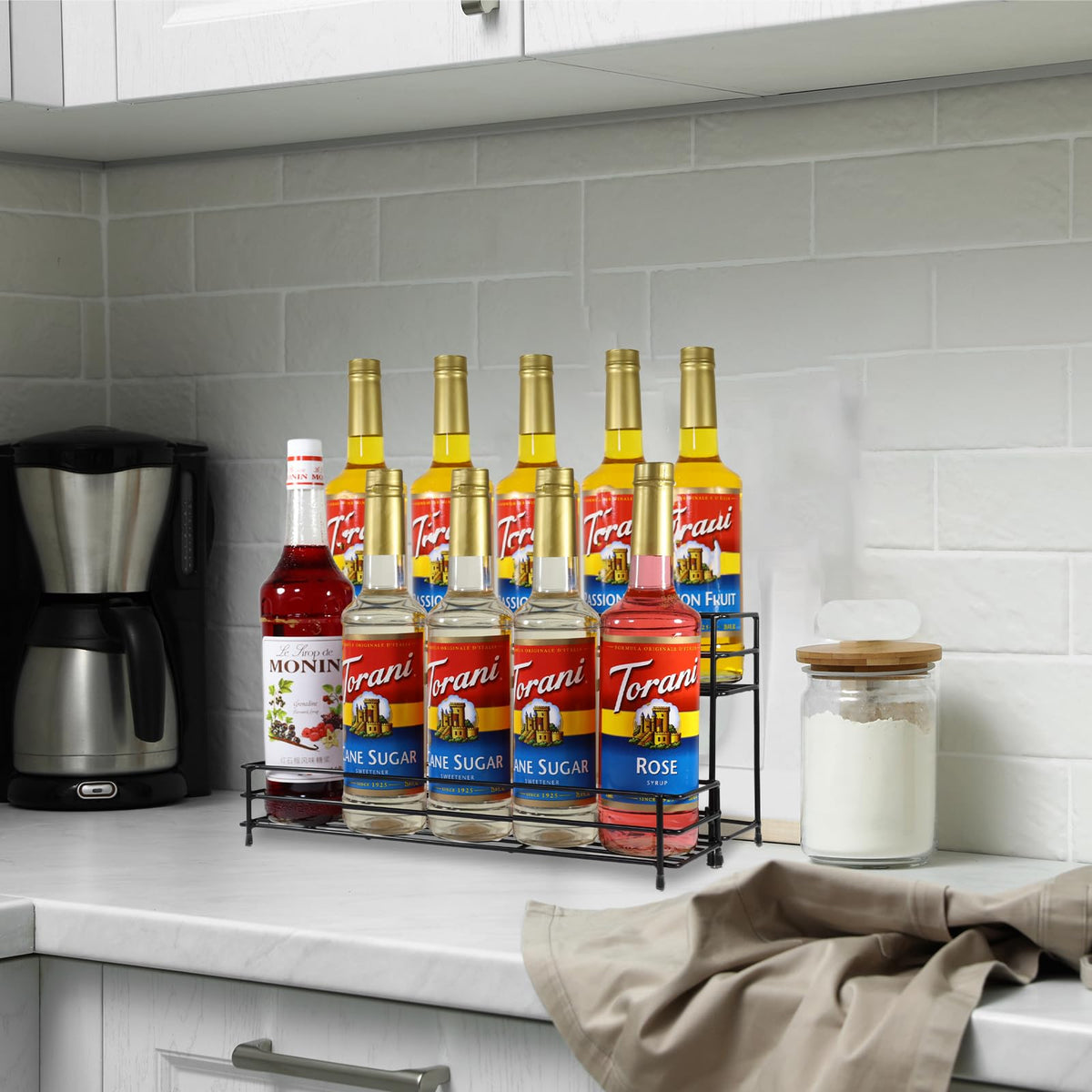 Rehuei syrup bottle display showing organized bottle lineup