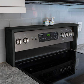 RELODECOR stove-top spice rack in ebony finish keeps spices within reach while cooking.