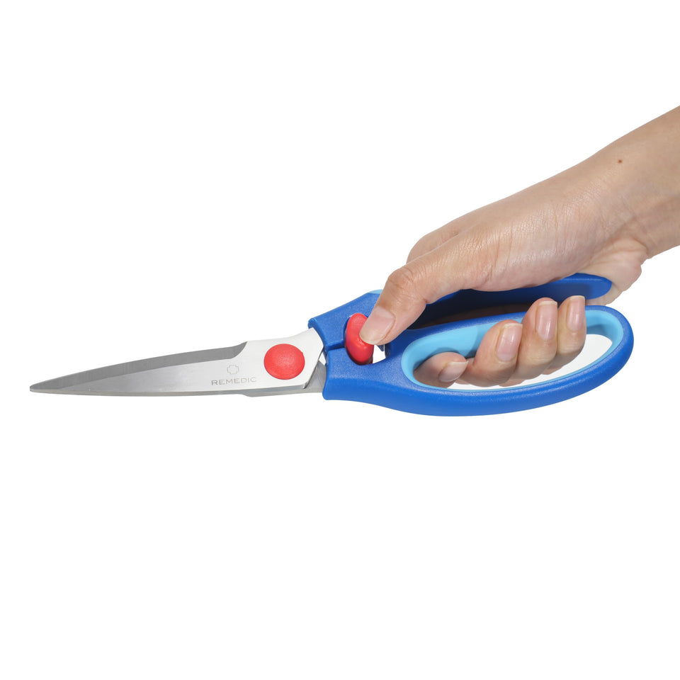 Remedic spring-loaded scissors blades in action for precise cuts