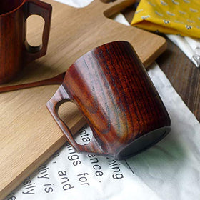 Renawe wooden mug with ergonomic handle for easy, steady pouring.