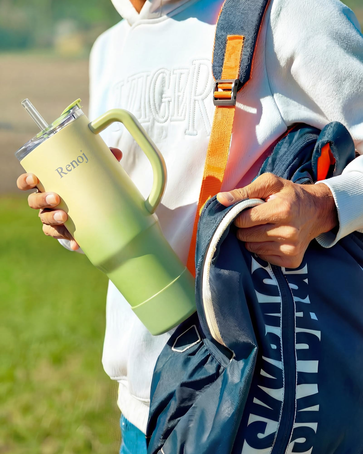 Renoj mug fits car cup holder for on-the-go convenience.