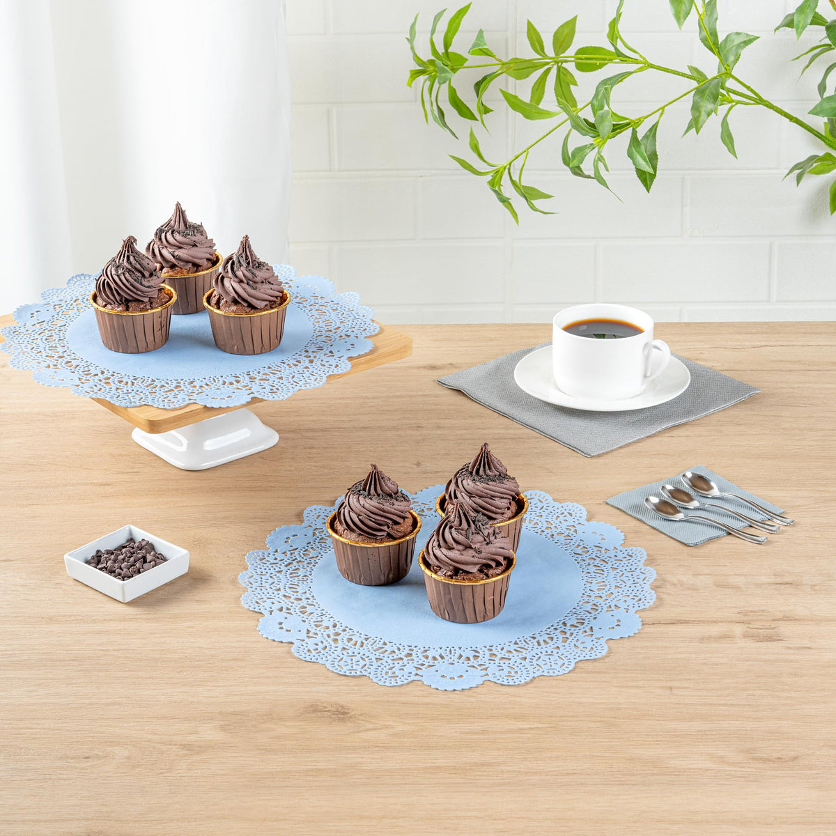 Cupcake display with Pastry Tek doilies for a refined tabletop setup