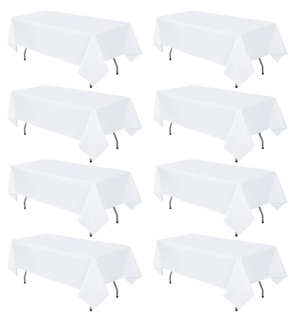 RestfulGlow 8-pack white tablecloth on a 60x126 inch rectangle table for elegant events.
